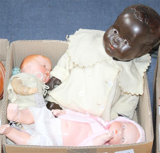 Two AM Dream babies, one closed mouth, one soft body, 18in. and 12in., and a black baby composition head, 10in. (3)